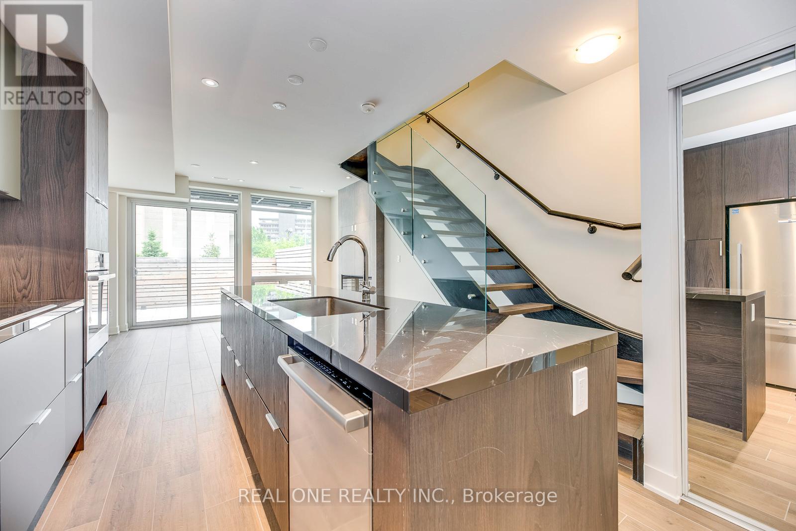 42 Sonic Way, Toronto, Ontario  M3C 0P3 - Photo 5 - C13717502