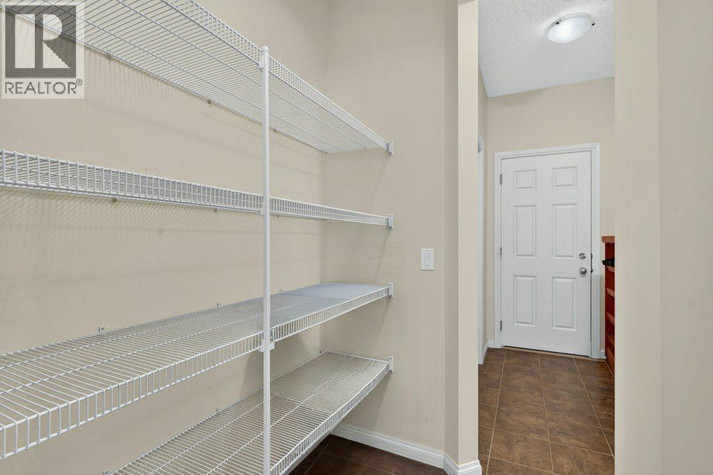 164 Aspenmere Close, Chestermere, Alberta T1X 0G3 - Photo 13 - A2337731