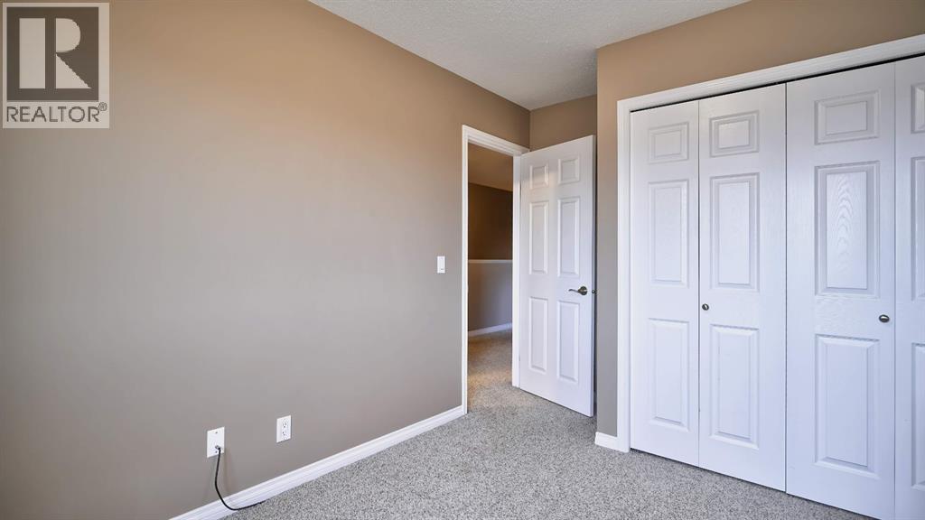 805, 620 Luxstone Landing SW, Airdrie, Alberta  T4B 0B6 - Photo 25 - A2300918