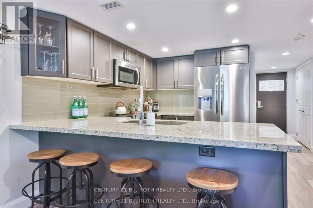 406 - 80 Horseshoe Boulevard, Oro-Medonte (Horseshoe Valley), Ontario  L4M 4Y8 - Photo 4 - S13718024