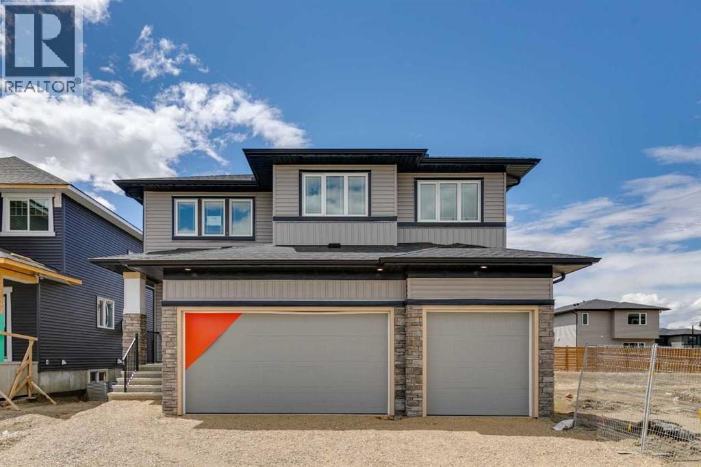 139 Dawson Wharf Mount, Chestermere, Alberta  T1X 2W3 - Photo 1 - A2317459