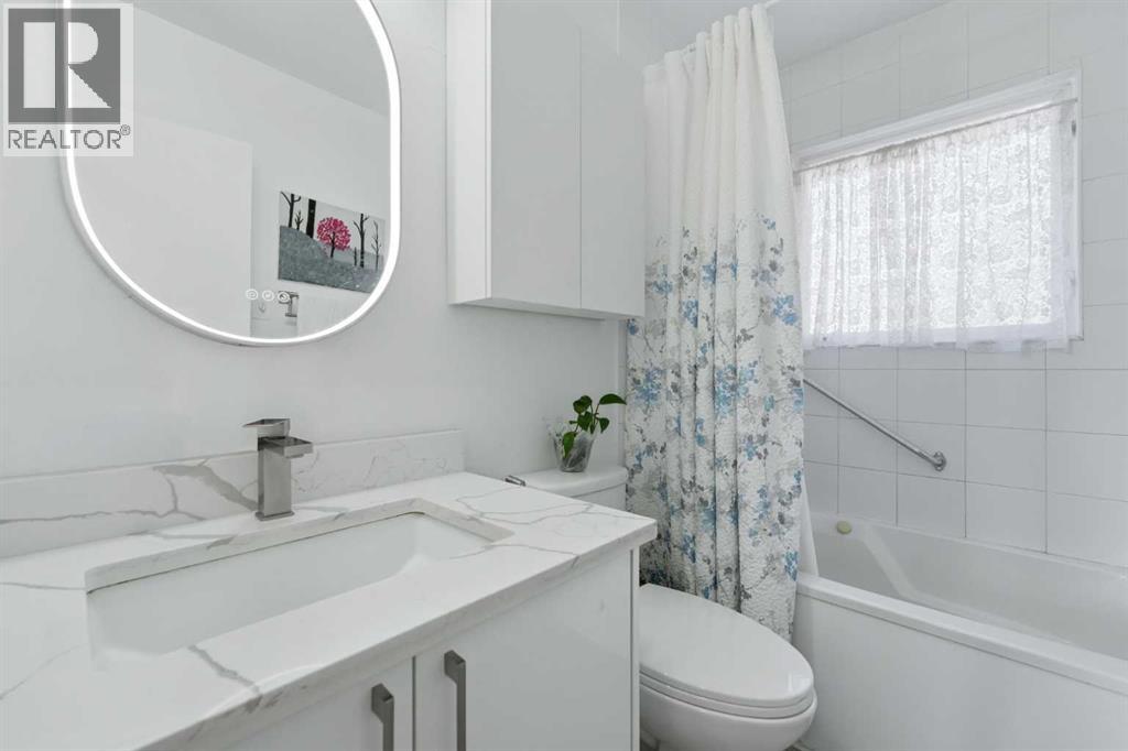 20 Rossburn Crescent SW, Calgary, Alberta  T3C 2N5 - Photo 14 - A2338828