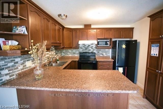 926 Grenfell Drive, London North, Ontario  N5X 4R8 - Photo 8 - X13719188