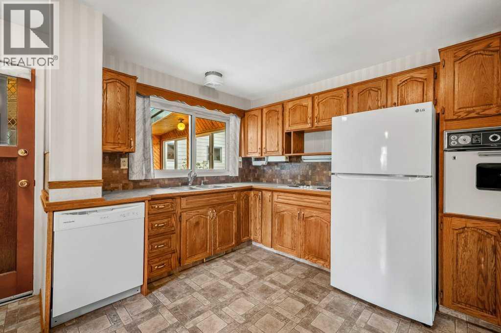 4515 Norquay Drive NW, Calgary, Alberta  T2K 2K9 - Photo 11 - A2338917