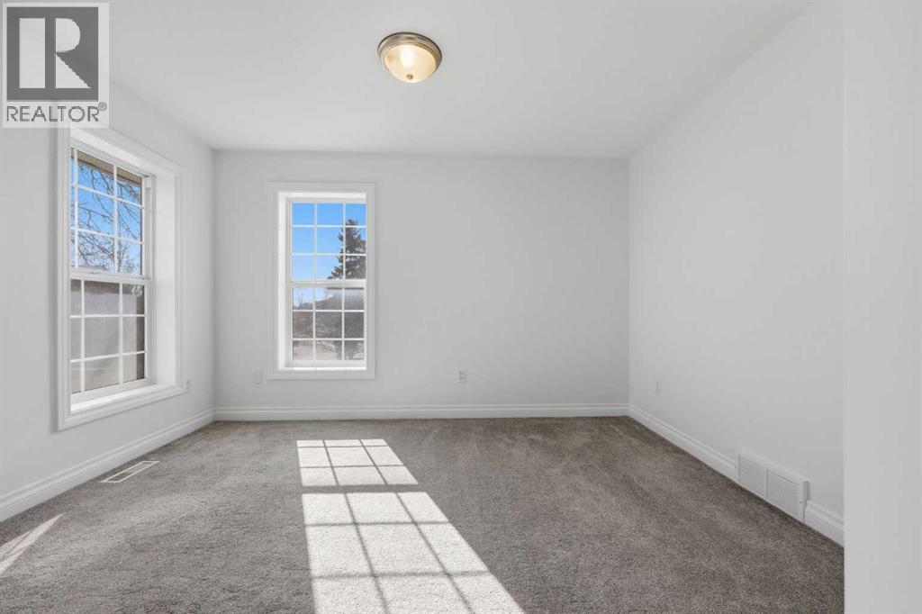 172 Somme Manor Sw, Calgary, Alberta  T2T 6L5 - Photo 26 - A2333607