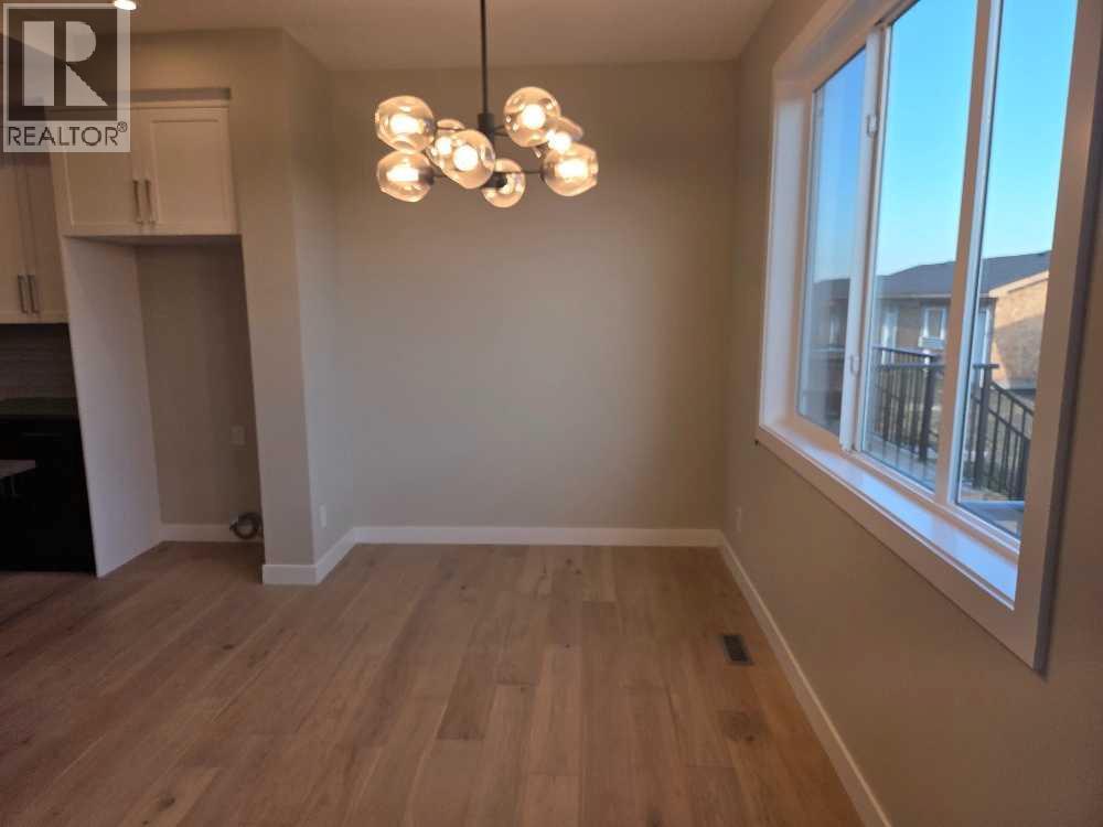 1130 Cobblestone Boulevard SW, Airdrie, Alberta  T4B 5W5 - Photo 12 - A2323046
