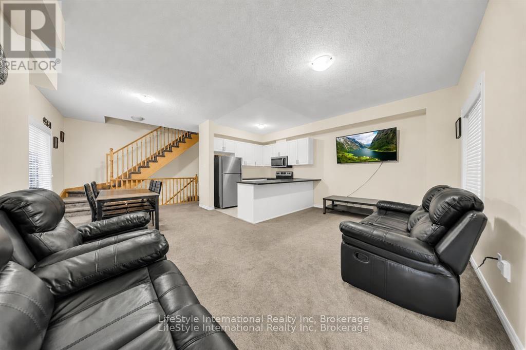 87 - 88 Decorso Drive, Guelph, Ontario  N1L 0A9 - Photo 4 - X13719506