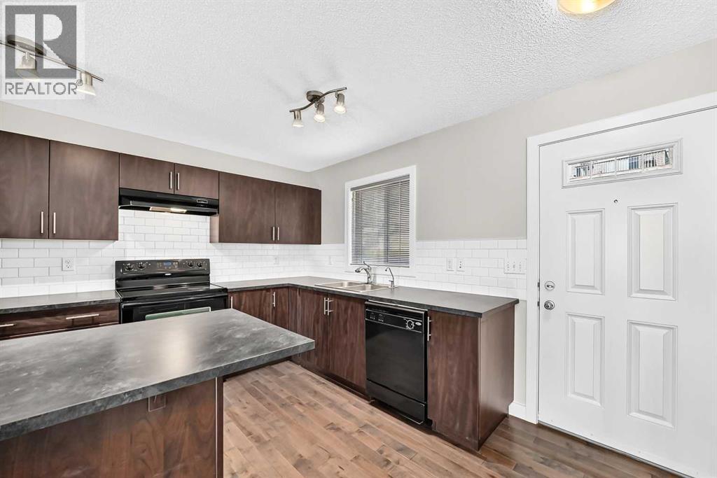 152 Pantego Lane NW, Calgary, Alberta  T3K 0T1 - Photo 9 - A2338088