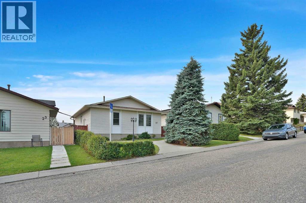 27 Bedridge Way NE, Calgary, Alberta  T3K 1M2 - Photo 31 - A2335133