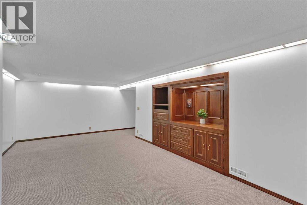 27 Bedridge Way NE, Calgary, Alberta  T3K 1M2 - Photo 25 - A2335133