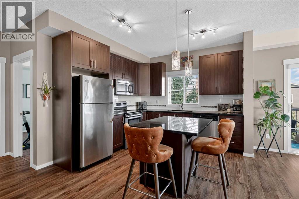 1409, 755 Copperpond Boulevard SE, Calgary, Alberta  T2Z 4R2 - Photo 4 - A2339563