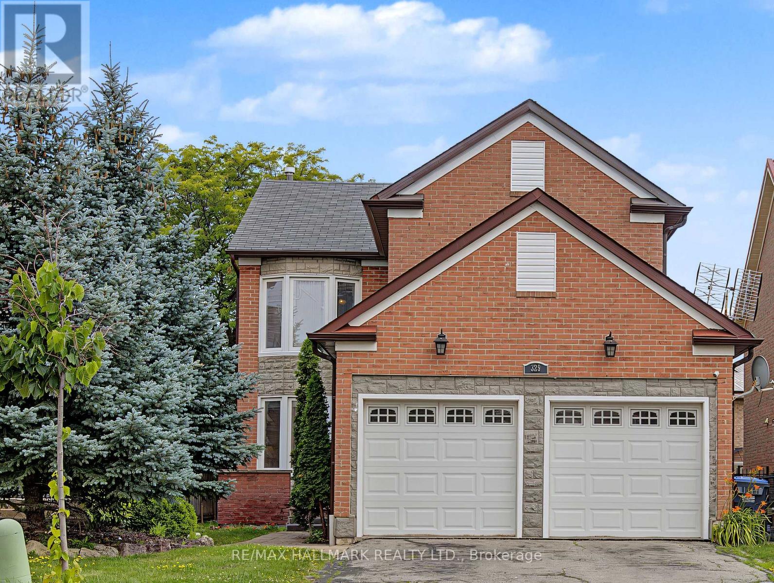 329 Kingsbridge Garden Circle, Mississauga, Ontario  L5R 1K9 - Photo 2 - W13721746