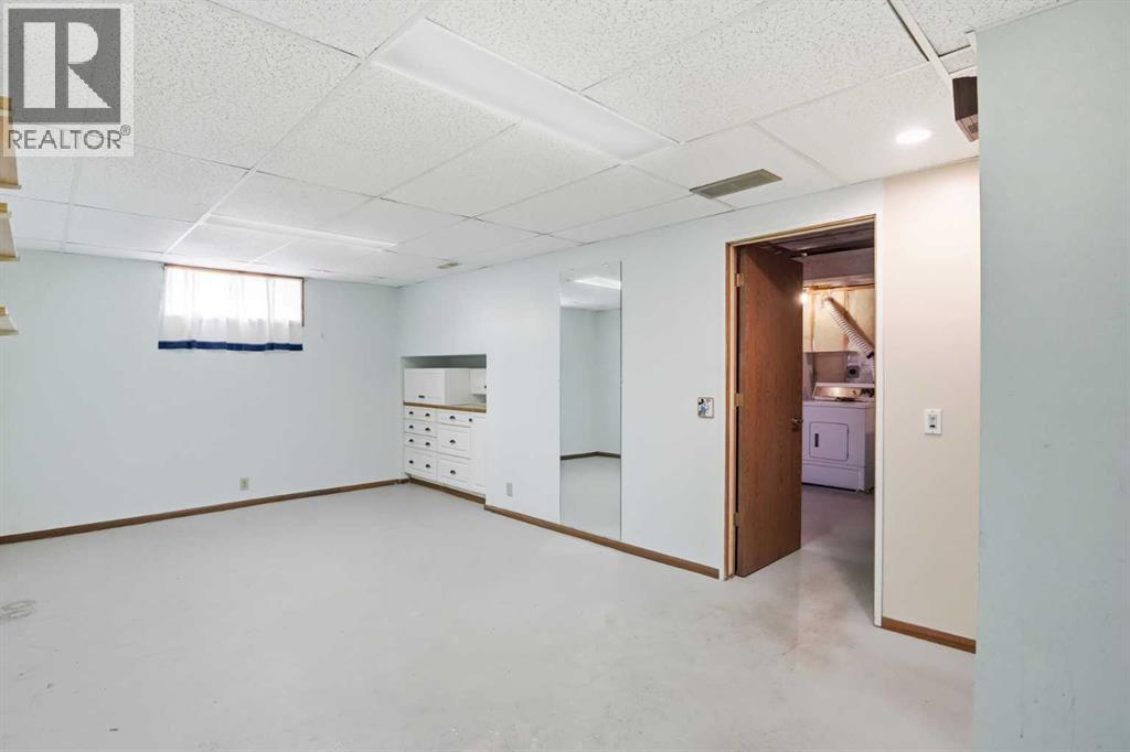 299 Woodside Circle SW, Calgary, Alberta  T2W 3K2 - Photo 24 - A2339809