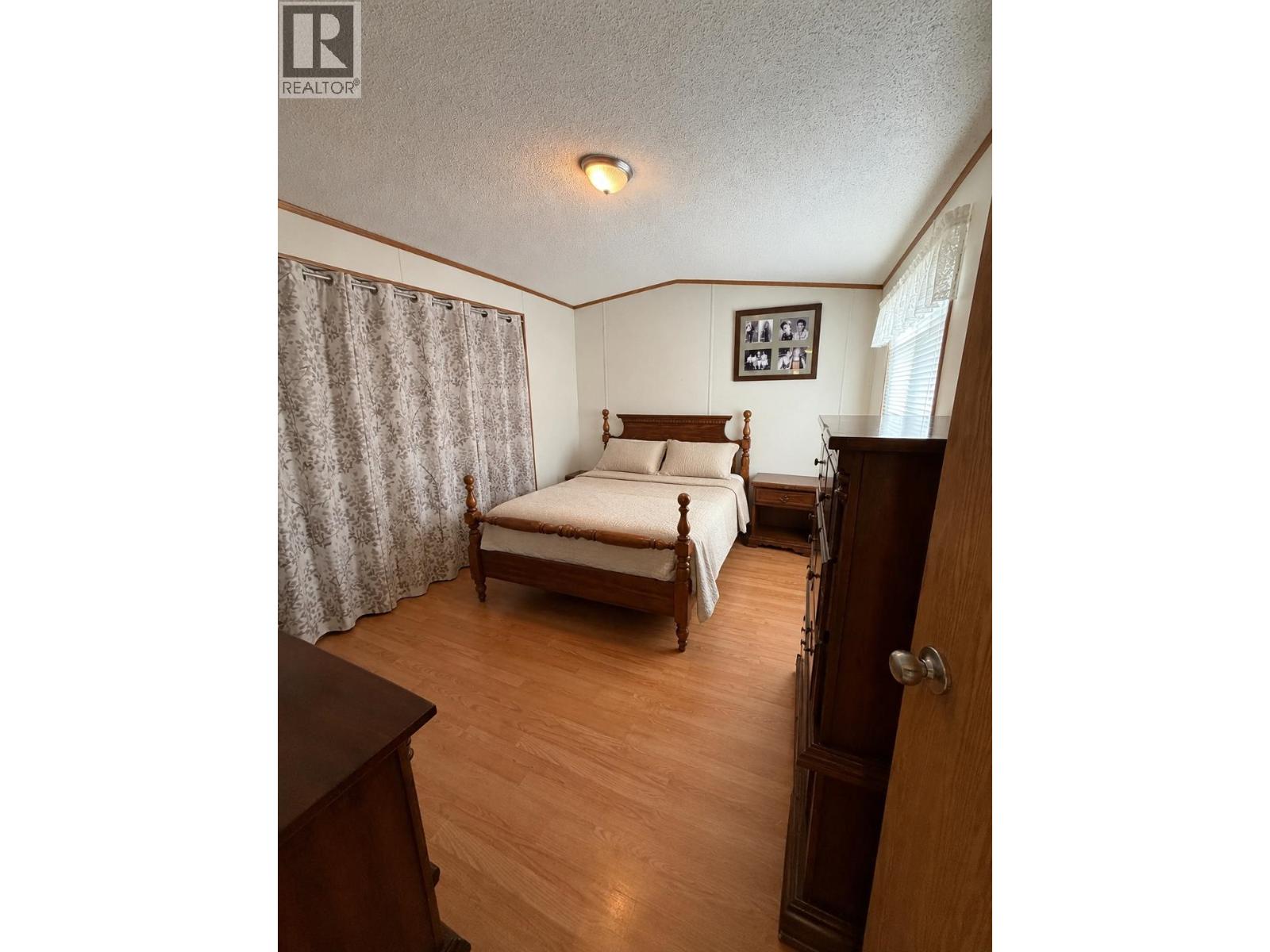 4580 Canim Hendrix Road, 100 Mile House, British Columbia  V0K 1M0 - Photo 4 - R3159463