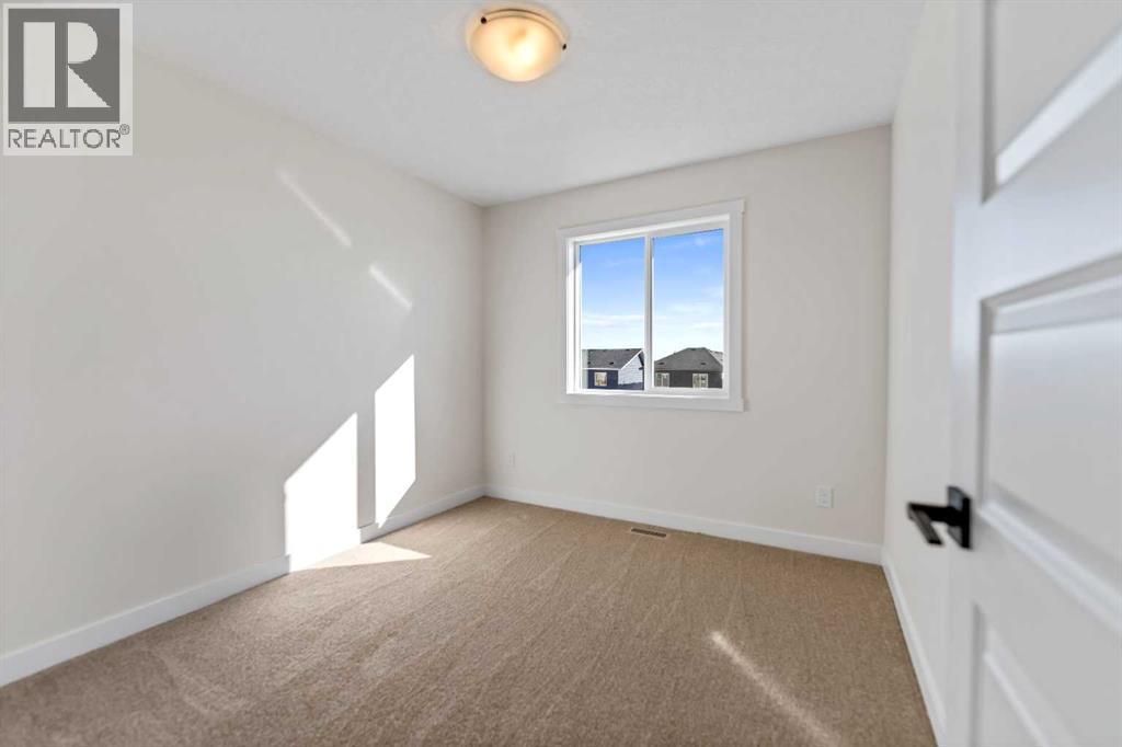 734 Bayview Hill Sw, Airdrie, Alberta  T4B 5M4 - Photo 18 - A2337913