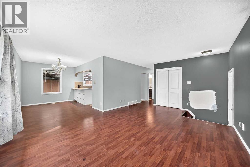 5116 Forego Avenue, Calgary, Alberta  T2A 2C6 - Photo 4 - A2340979