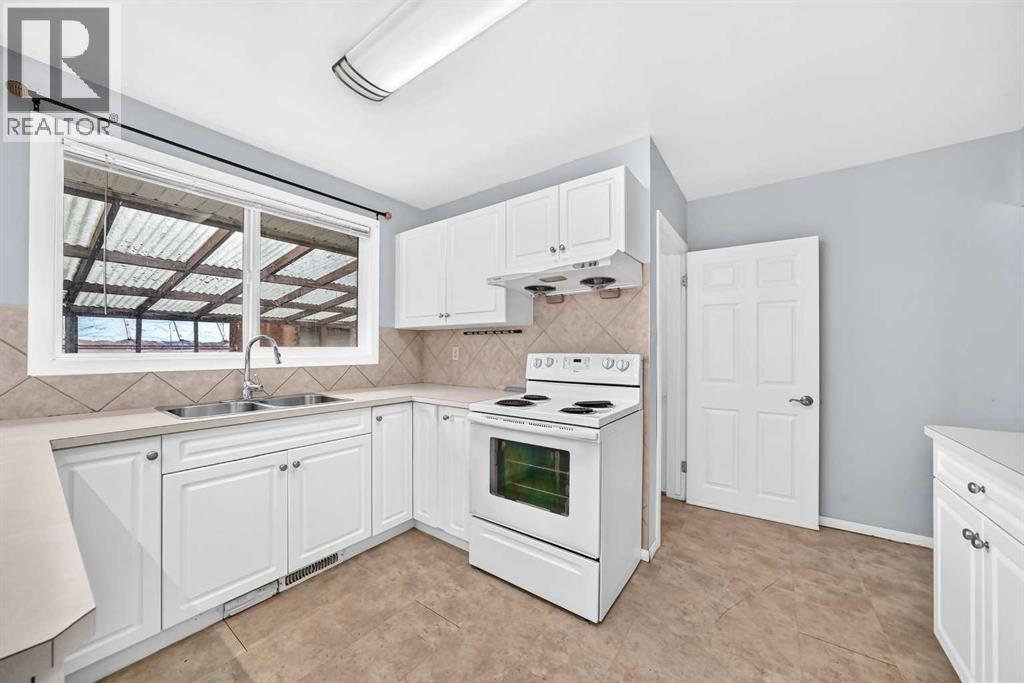 5116 Forego Avenue, Calgary, Alberta  T2A 2C6 - Photo 7 - A2340979