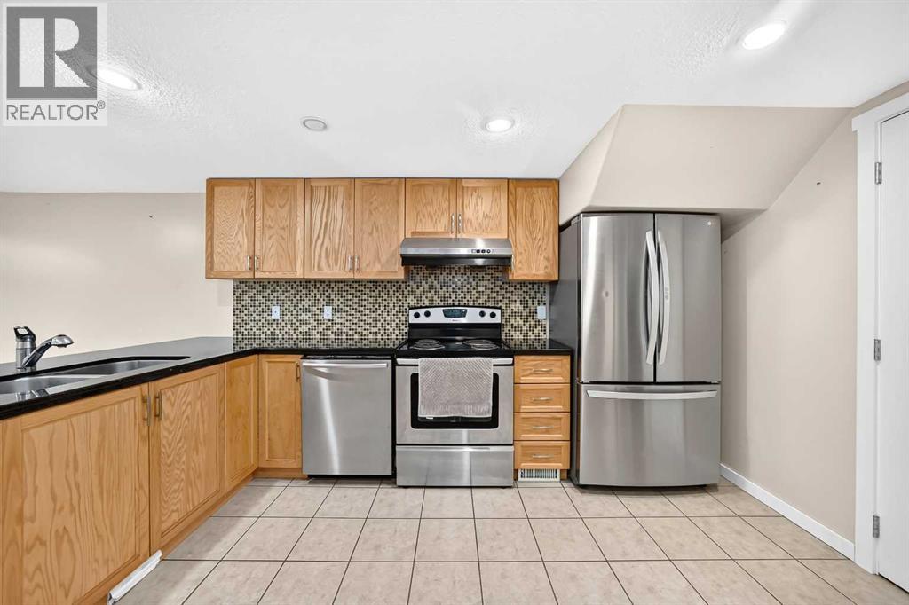 5116 Forego Avenue, Calgary, Alberta  T2A 2C6 - Photo 19 - A2340979
