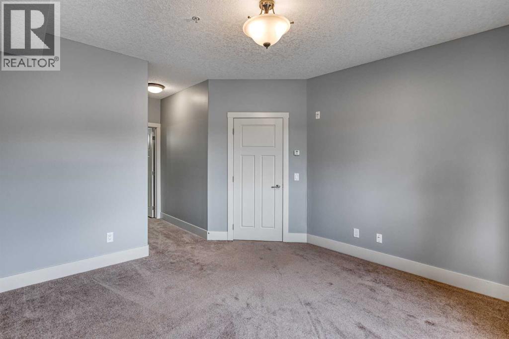 117, 77 George Fox Trail W, Cochrane, Alberta T4C 0N1 - Photo 14 - A2340713