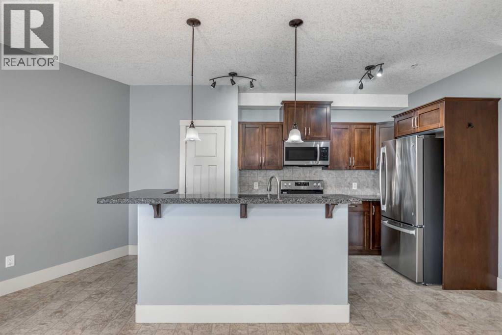 117, 77 George Fox Trail W, Cochrane, Alberta T4C 0N1 - Photo 4 - A2340713