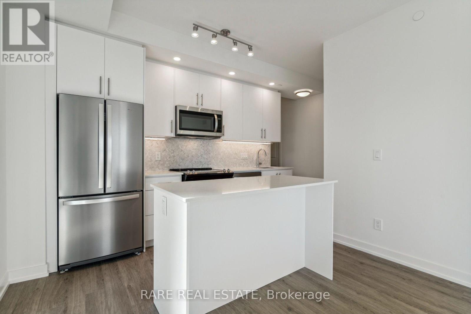 603 - 345 Wheat Boom Drive, Oakville, Ontario  L6H 7X5 - Photo 3 - W13714030