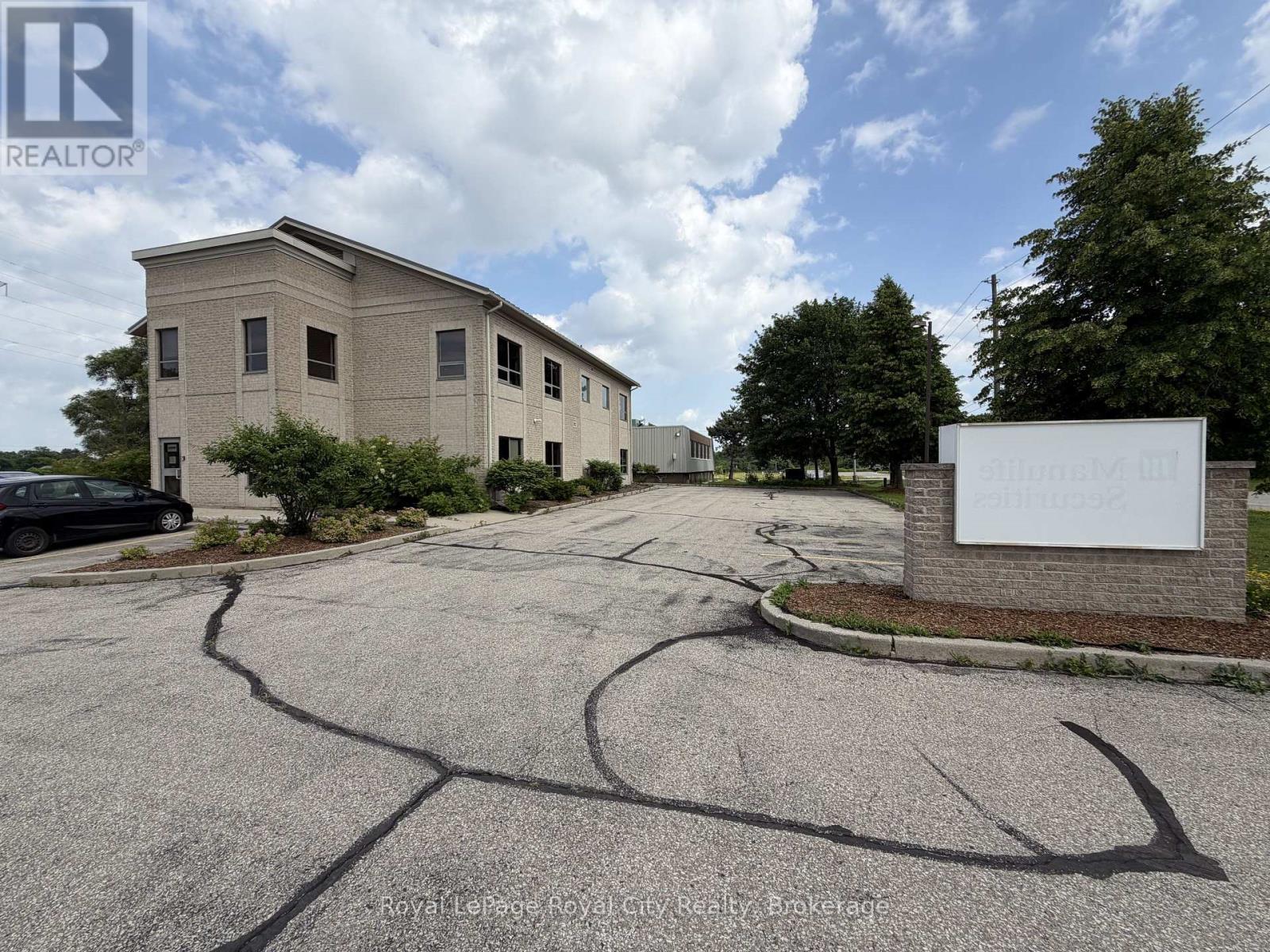 200 - 21 Lewis Road, Guelph (Willow West/sugarbush/west Acres), Ontario  N1H 1E9 - Photo 2 - X13723994