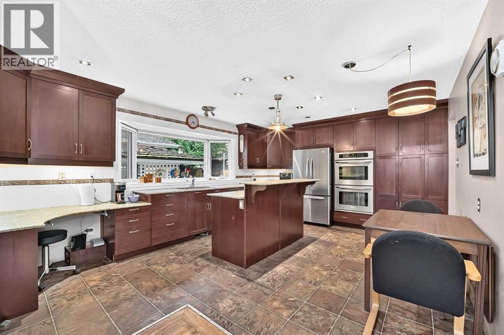 728 Willacy Drive SE, Calgary, Alberta  T2J 2B1 - Photo 2 - A2338787
