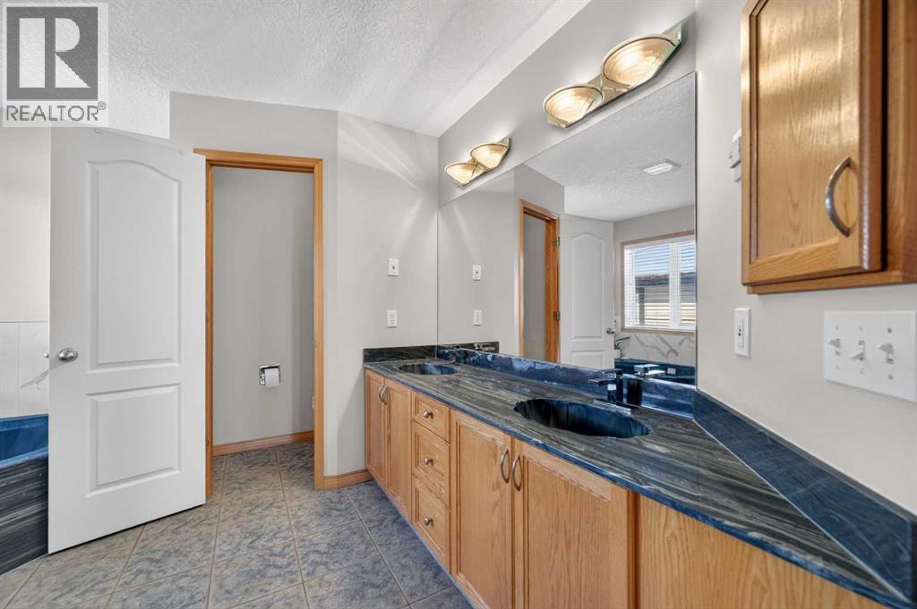 359 Rocky Ridge Drive NW, Calgary, Alberta  T3G 4X3 - Photo 27 - A2334046