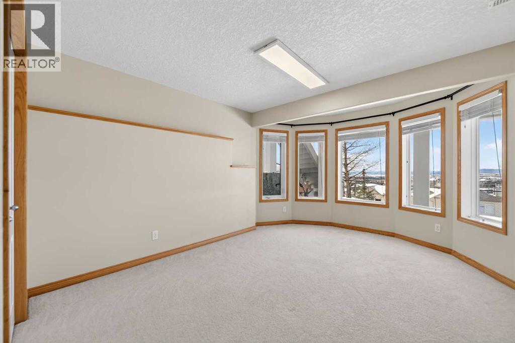 359 Rocky Ridge Drive NW, Calgary, Alberta  T3G 4X3 - Photo 43 - A2334046