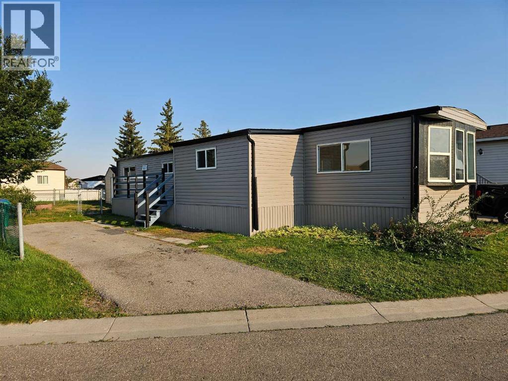 71, 1101 84  NE, Calgary, Alberta  T2A 7X2 - Photo 2 - A2340145