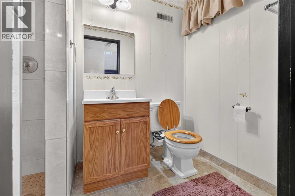 7035 Huntercrest Road NW, Calgary, Alberta  T2K 4J9 - Photo 24 - A2338998