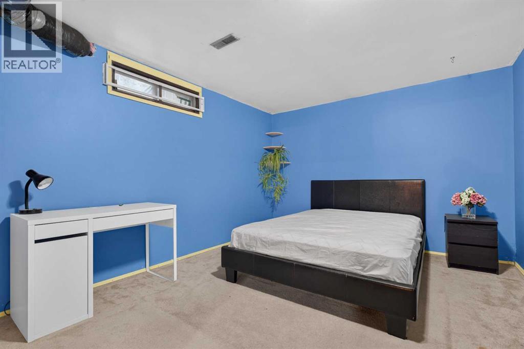 7035 Huntercrest Road NW, Calgary, Alberta  T2K 4J9 - Photo 26 - A2338998