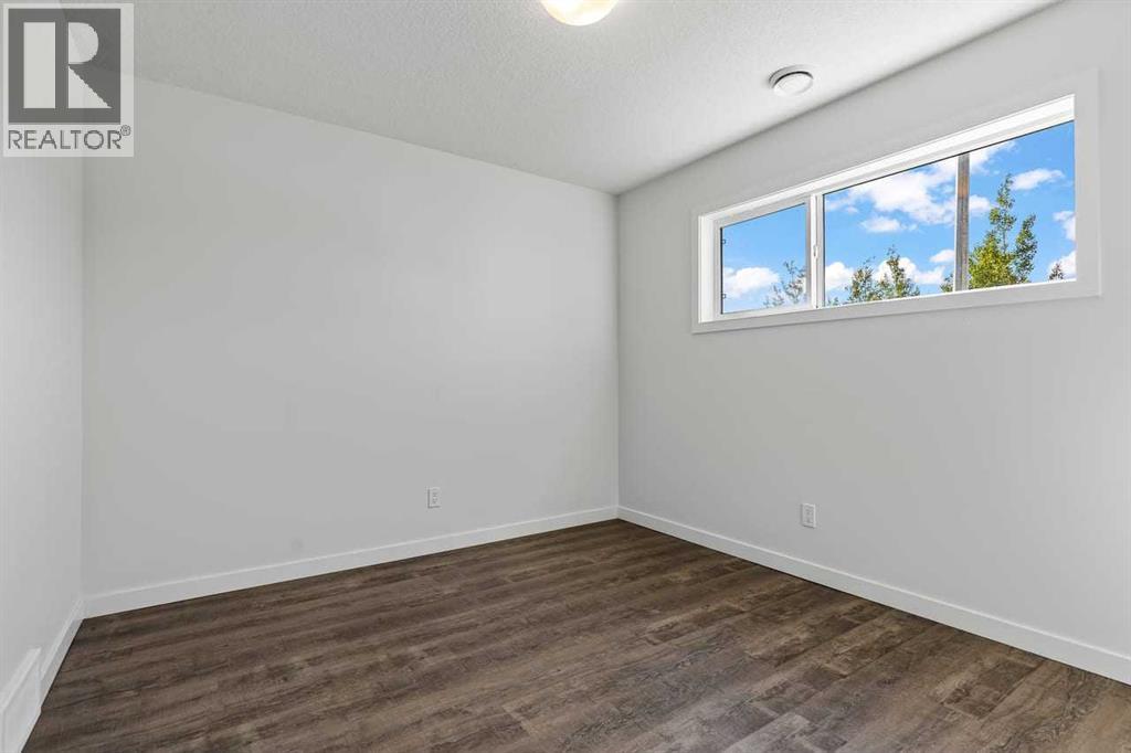 30 Evanscrest Manor NW, Calgary, Alberta T3P 2A3 - Photo 5 - A2338572