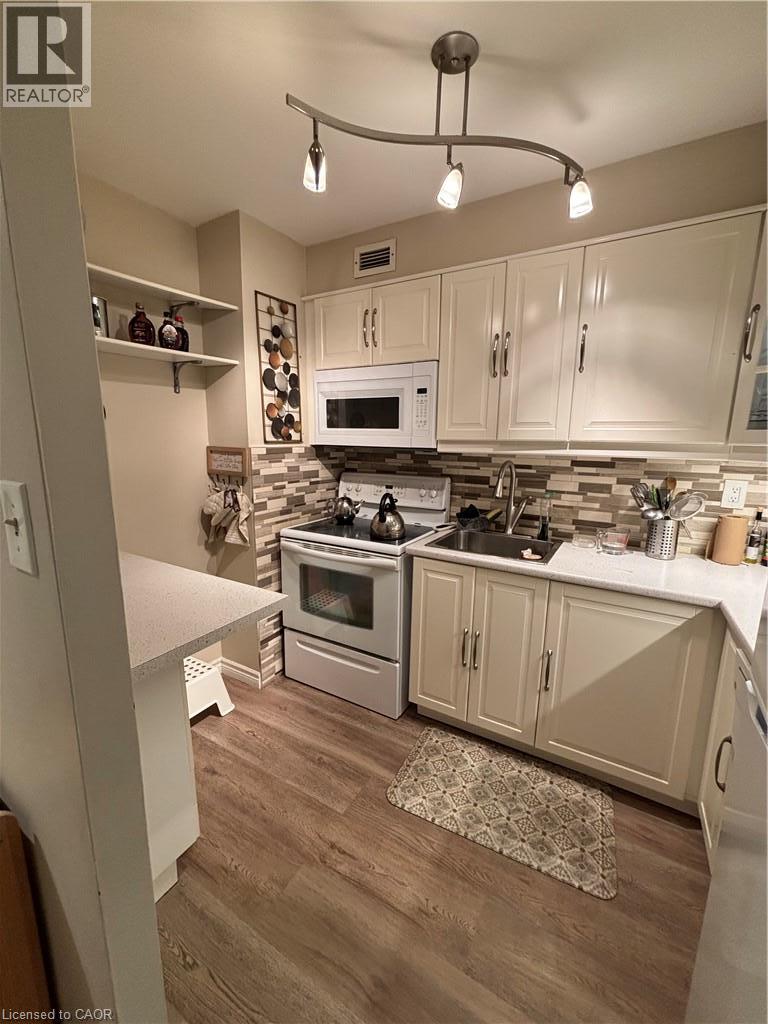 975 Warwick Court Unit# 205, Burlington, Ontario  L7T 3Z7 - Photo 2 - 40859173