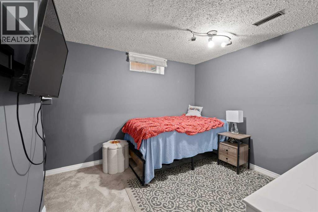 46 Westwood Drive SW, Calgary, Alberta  T3C 2V7 - Photo 26 - A2340895