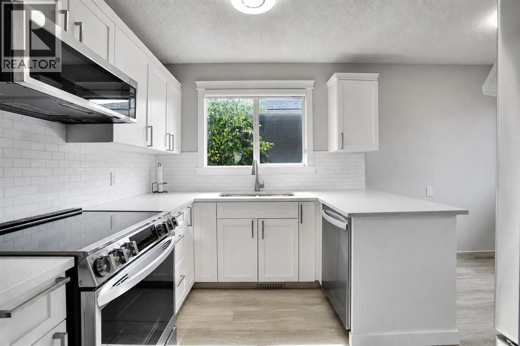 115 Abingdon Crescent NE, Calgary, Alberta  T2A 6W8 - Photo 7 - A2334535