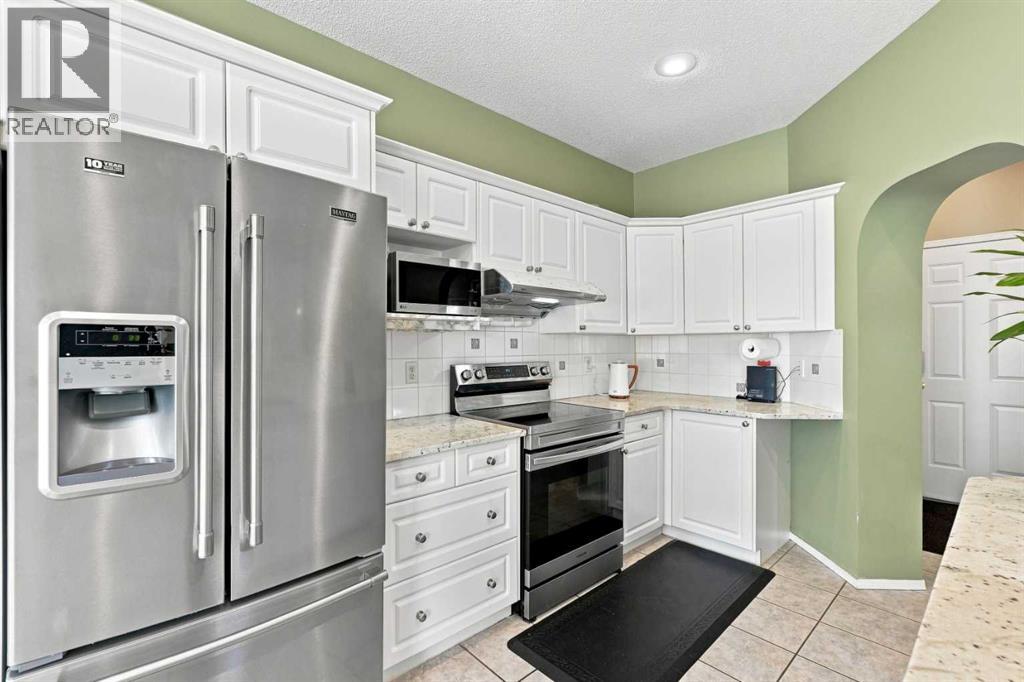 113 Rocky Ridge Point NW, Calgary, Alberta  T3G 4R5 - Photo 12 - A2340821