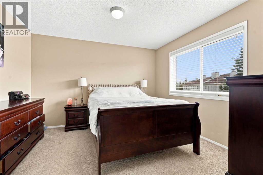 113 Rocky Ridge Point NW, Calgary, Alberta  T3G 4R5 - Photo 19 - A2340821