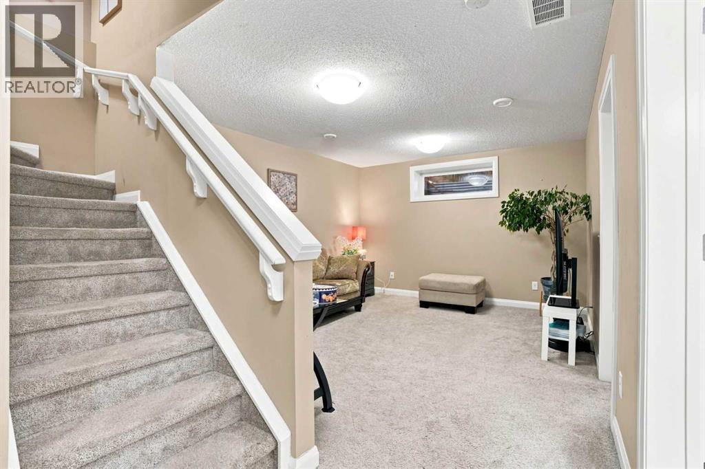 113 Rocky Ridge Point NW, Calgary, Alberta  T3G 4R5 - Photo 28 - A2340821