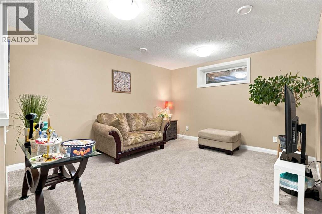 113 Rocky Ridge Point NW, Calgary, Alberta  T3G 4R5 - Photo 29 - A2340821