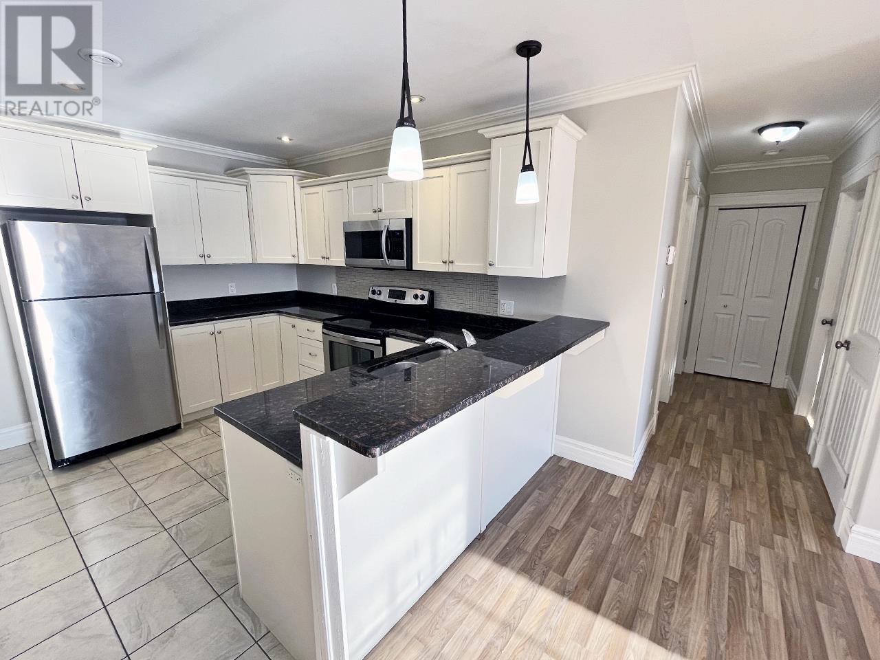 203 53 Glen Stewart Drive, Stratford, Prince Edward Island  C1B 2A8 - Photo 2 - 202621890