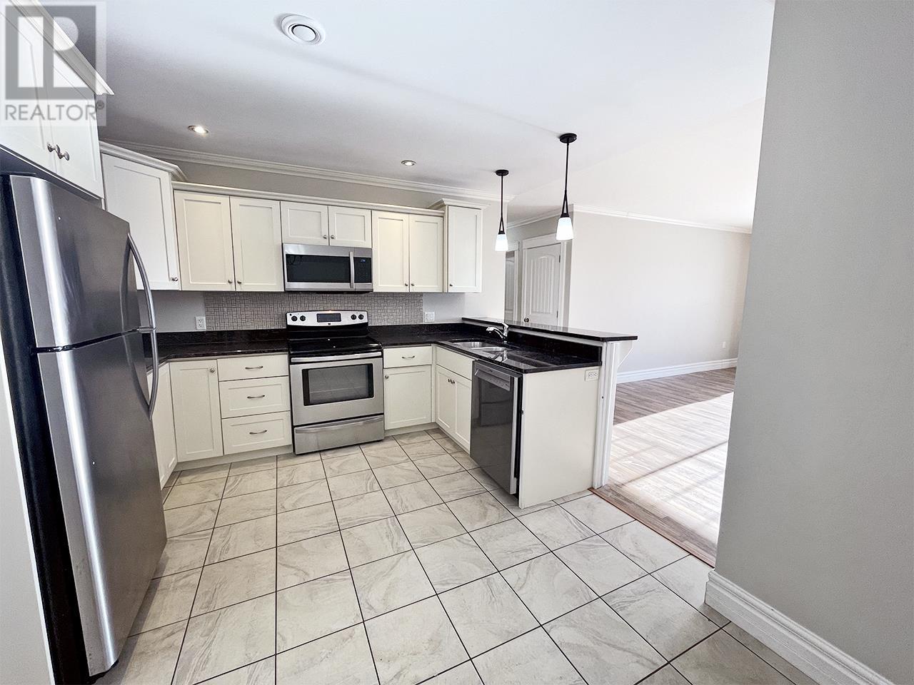 203 53 Glen Stewart Drive, Stratford, Prince Edward Island  C1B 2A8 - Photo 4 - 202621890