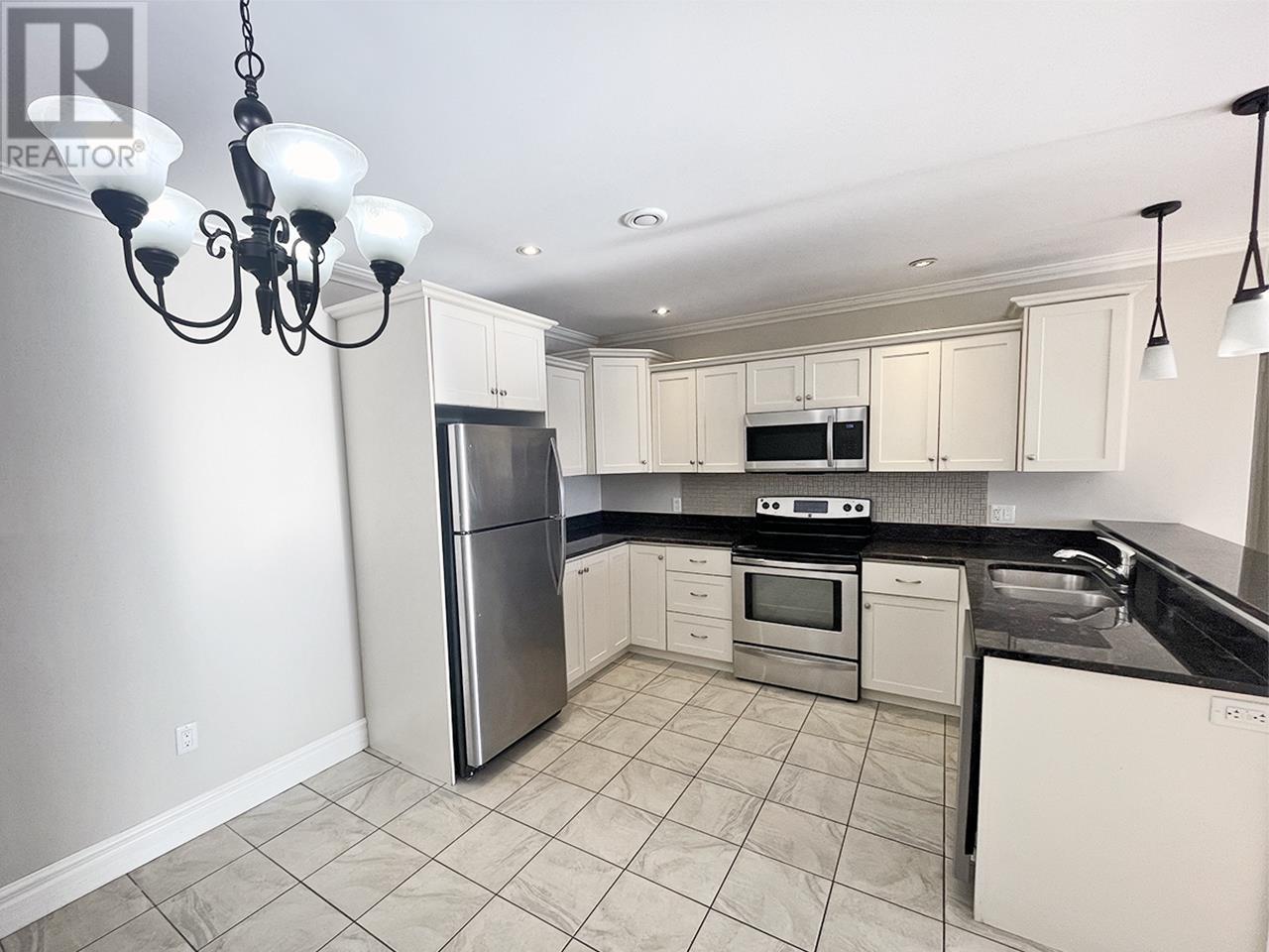 203 53 Glen Stewart Drive, Stratford, Prince Edward Island  C1B 2A8 - Photo 5 - 202621890