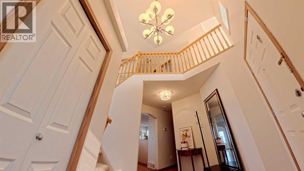 210 Panamount Hill NW, Calgary, Alberta  T3K 5P5 - Photo 4 - A2330714