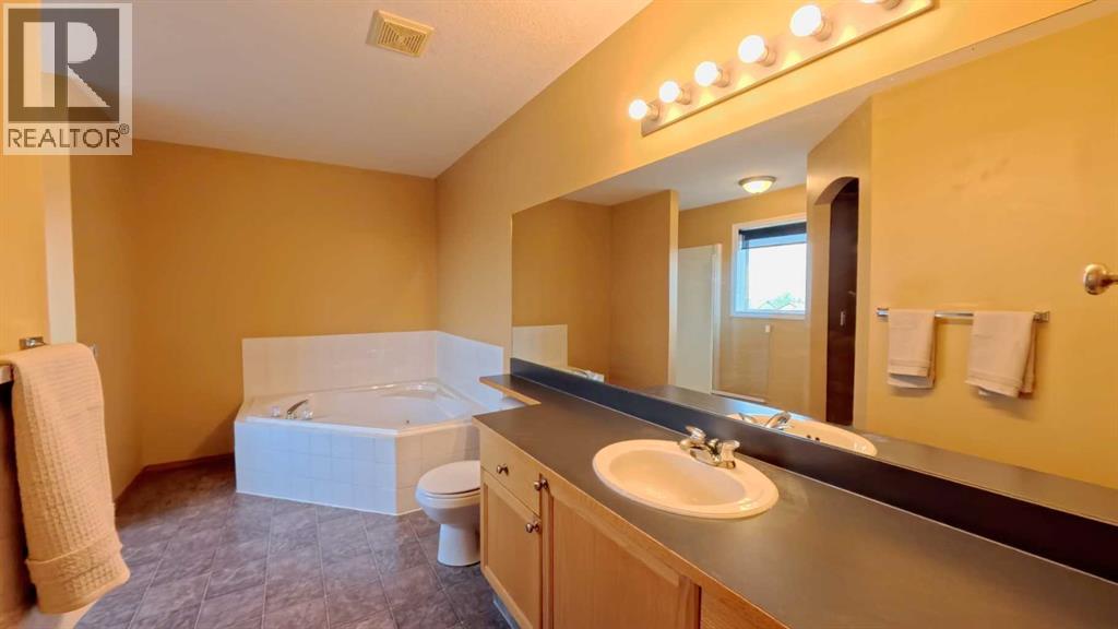210 Panamount Hill NW, Calgary, Alberta  T3K 5P5 - Photo 22 - A2330714