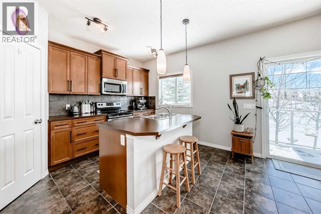 296 Sunset Point, Cochrane, Alberta  T4C 0K8 - Photo 8 - A2338909