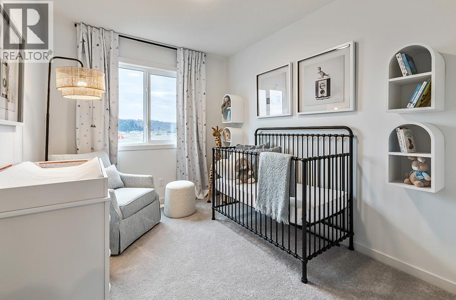 270 Creekside Manor SW, Calgary, Alberta  T2X 4B9 - Photo 8 - A2336327