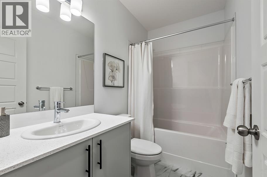 270 Creekside Manor SW, Calgary, Alberta  T2X 4B9 - Photo 9 - A2336327