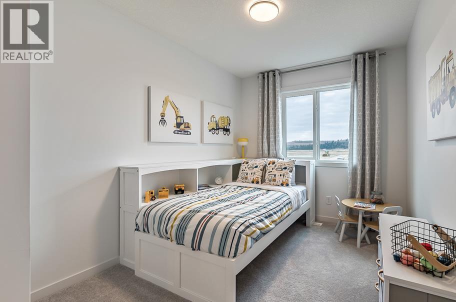 270 Creekside Manor SW, Calgary, Alberta  T2X 4B9 - Photo 7 - A2336327
