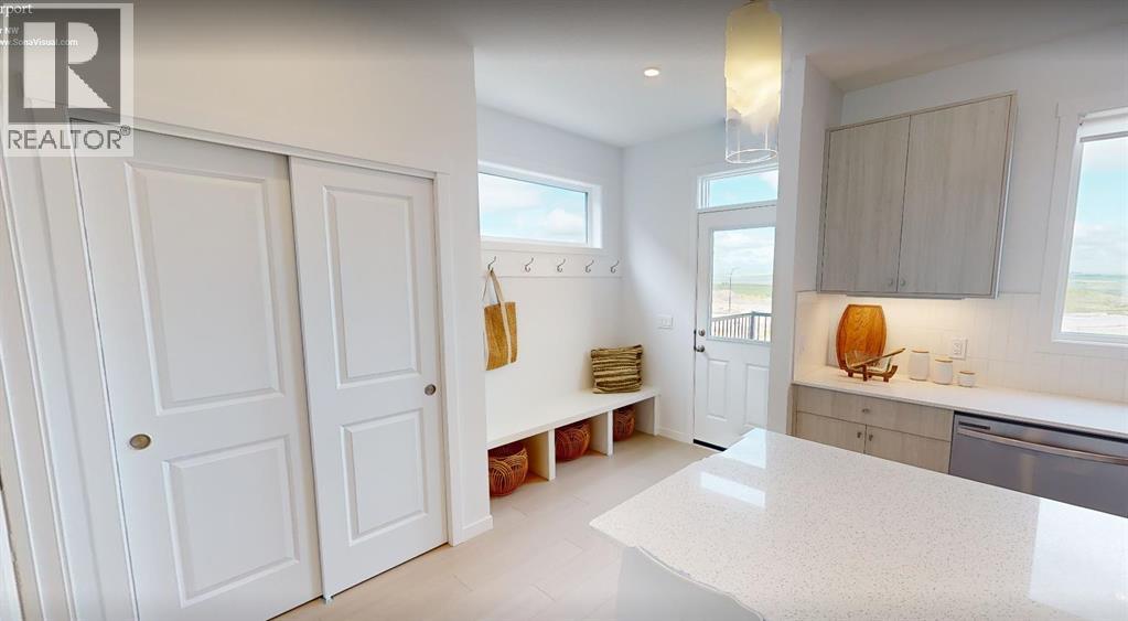 271 Creekside Manor SW, Calgary, Alberta  T2X 4B9 - Photo 8 - A2340024
